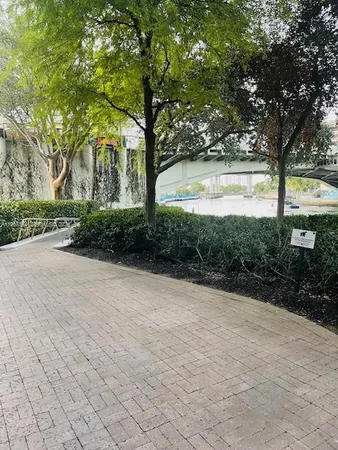 a view of a hallway with seating area