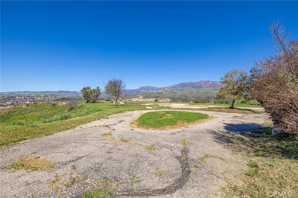 18500 South Mountain Road Santa Paula, CA 93060 - Photo 2 of 35 a view of a lake with a yard