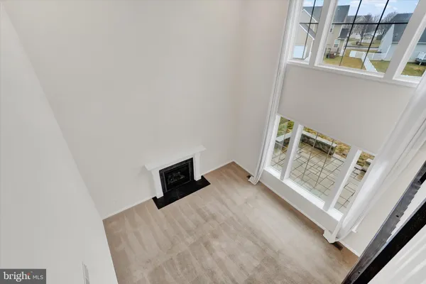 a bedroom with a bed and a tv