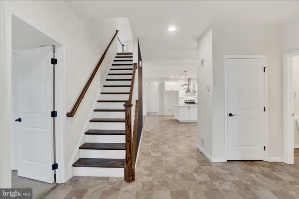 a view of entryway with white walls and white walls
