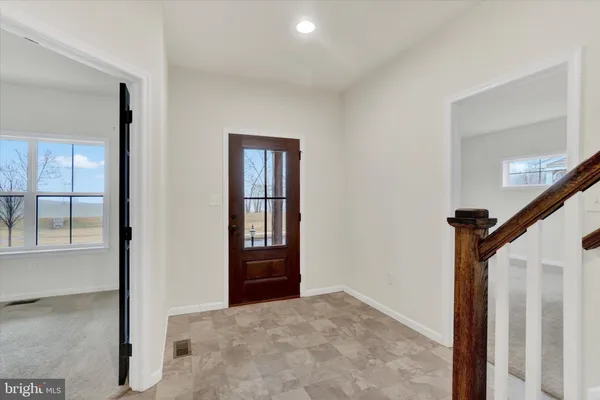 a view of entryway with stairs