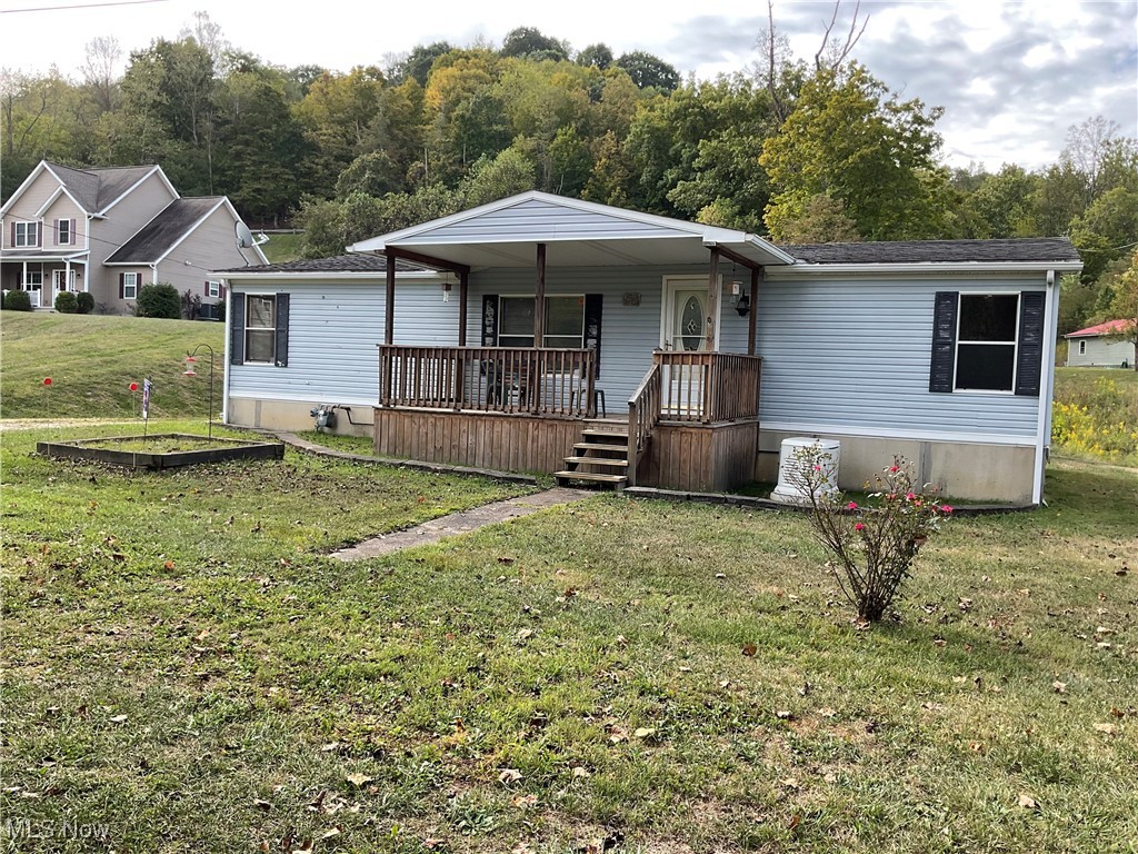 906 Greens Run Road St. Marys, WV 26170 - Photo 1 of 14 View of front of home and nice front yard