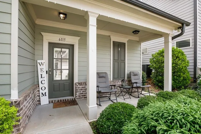 a garden view with outdoor seating