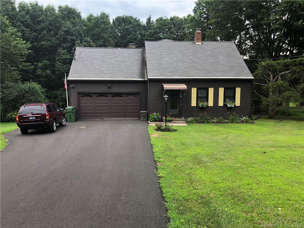 a car parked in front of a house