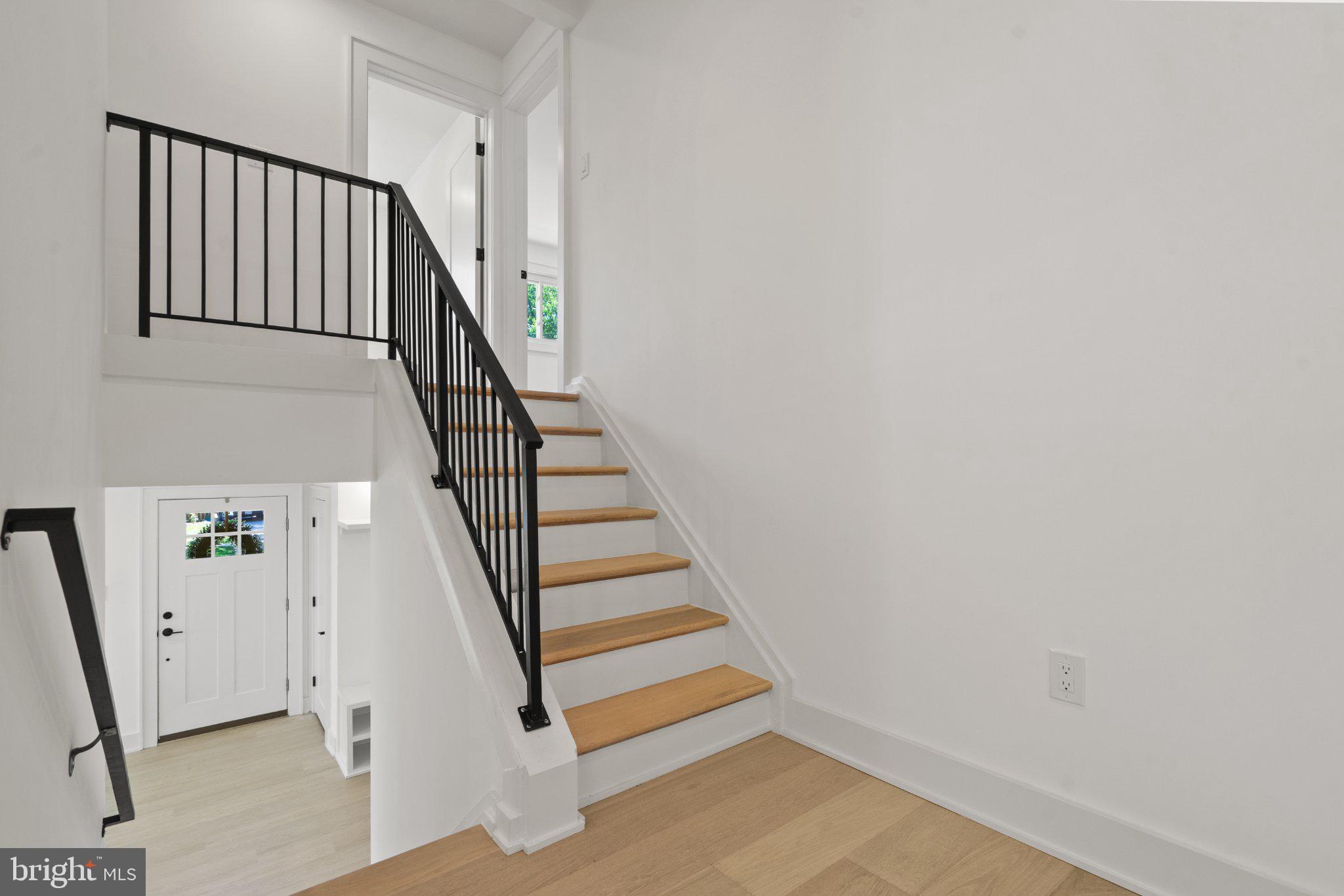 209 Thistle Drive Silver Spring, MD 20901 - Photo 24 of 34 Inviting entryway with modern staircase.