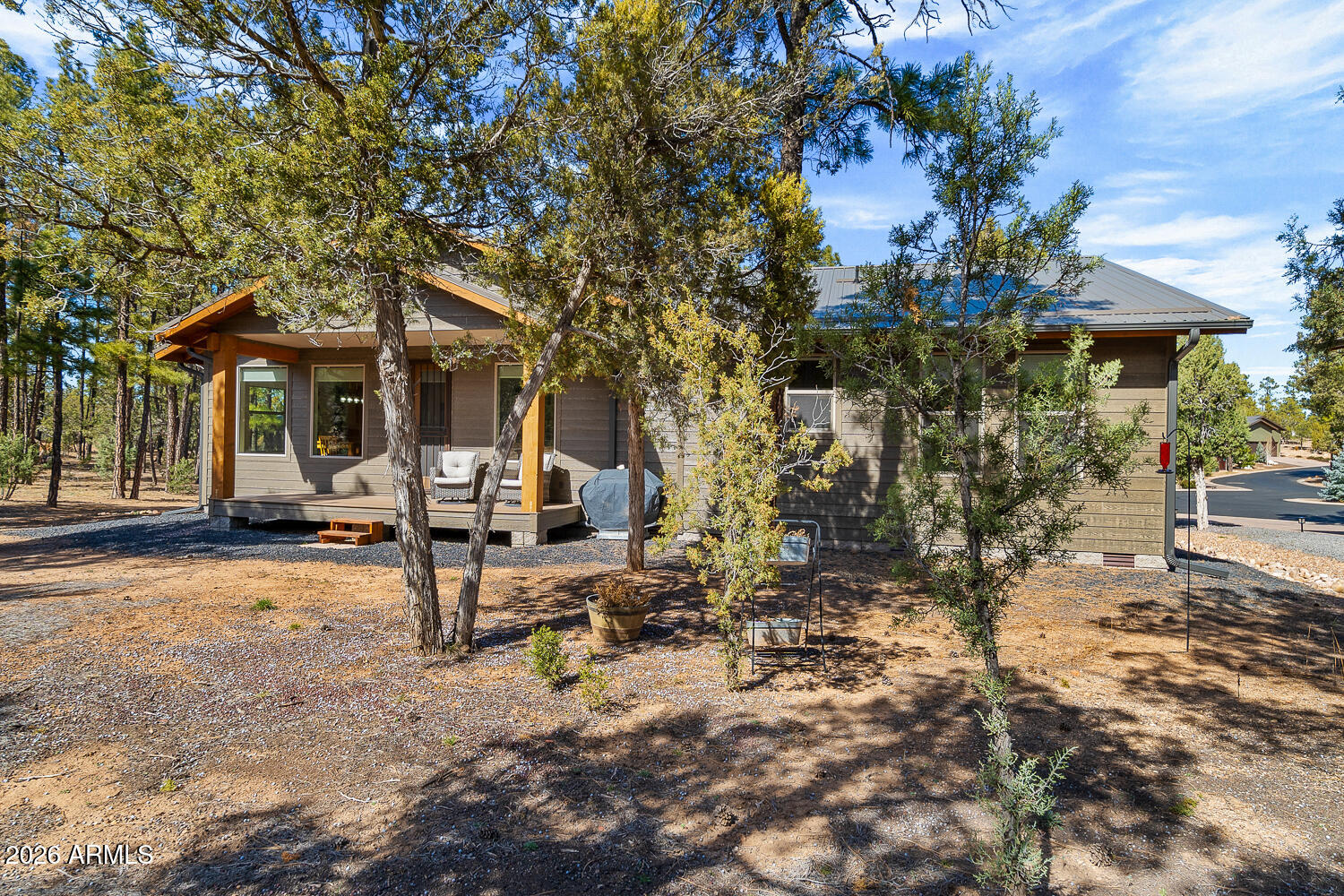 3160 North Eagle Landing Road Show Low, AZ 85901 - Photo 34 of 37 a view of a house with backyard and sitting area