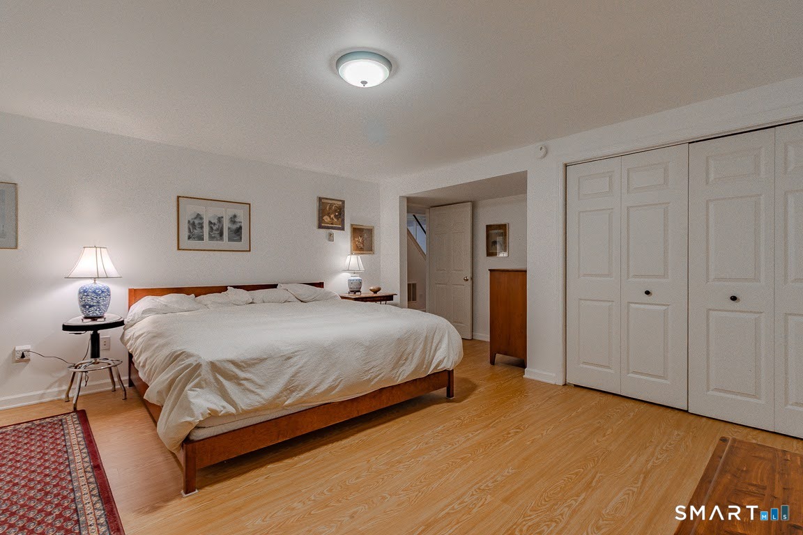 5 Thelbridge Street, Unit 5 Madison, CT 06443 - Photo 27 of 37 Lower Level Guest Room