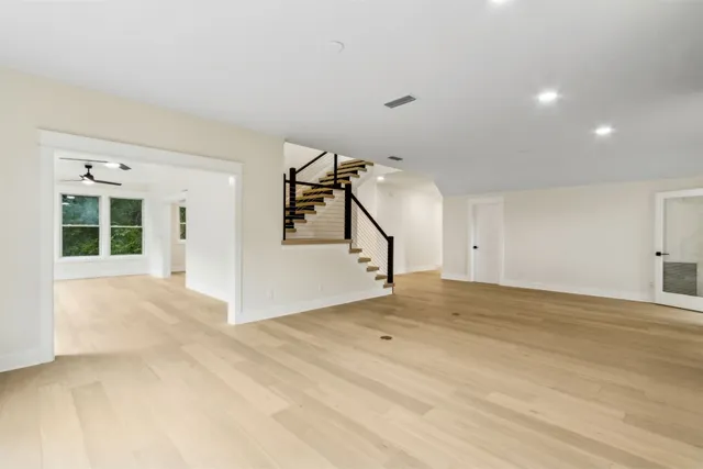 a kitchen with cabinets and stainless steel appliances