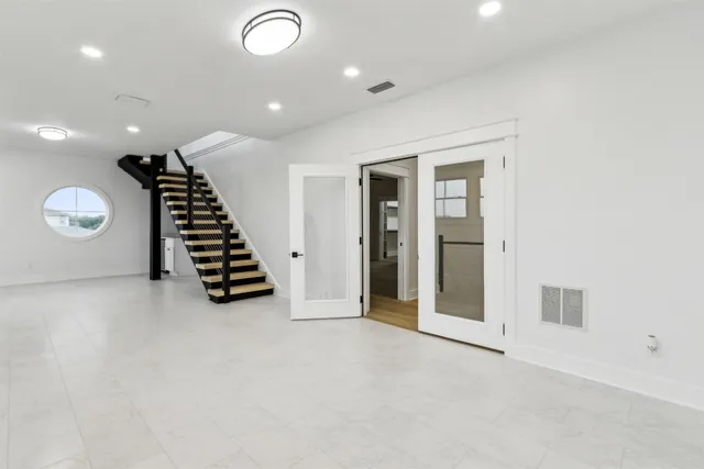 a bathroom with a sink a vanity and a mirror