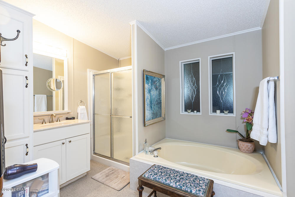 747 Navigators Way Edgewater, FL 32141 - Photo 23 of 67 22 Master Bathroom