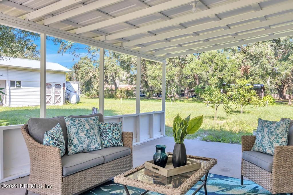 9750 Hood Road Jacksonville, FL 32257 - Photo 35 of 53 a building outdoor space with patio furniture