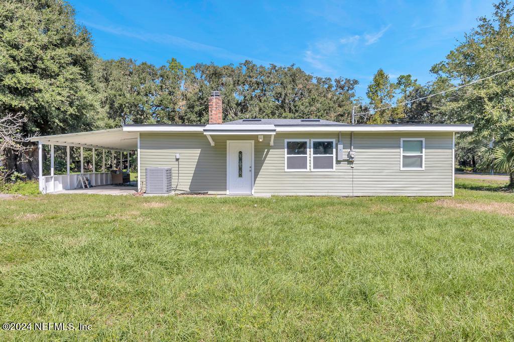 9750 Hood Road Jacksonville, FL 32257 - Photo 38 of 53 a view of a house with a backyard