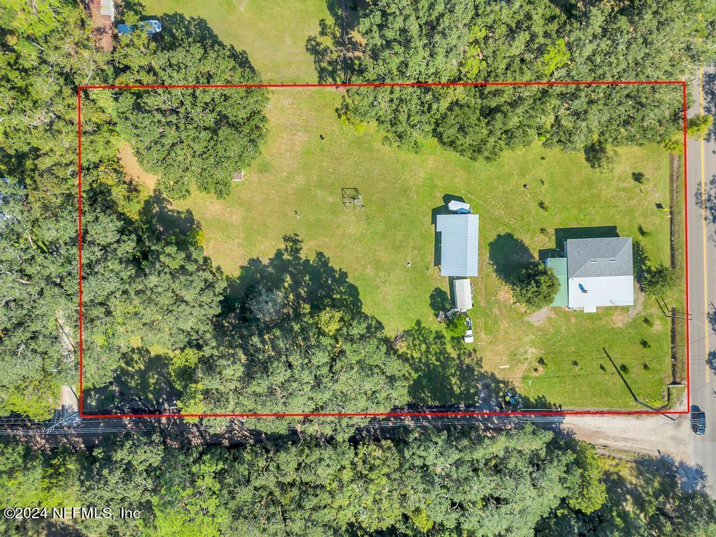 9750 Hood Road Jacksonville, FL 32257 - Photo 50 of 53 an aerial view of a house with a yard