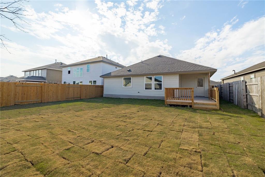 208 Evening Star Lane Georgetown, TX 78628 - Photo 24 of 26 a house view with a garden space