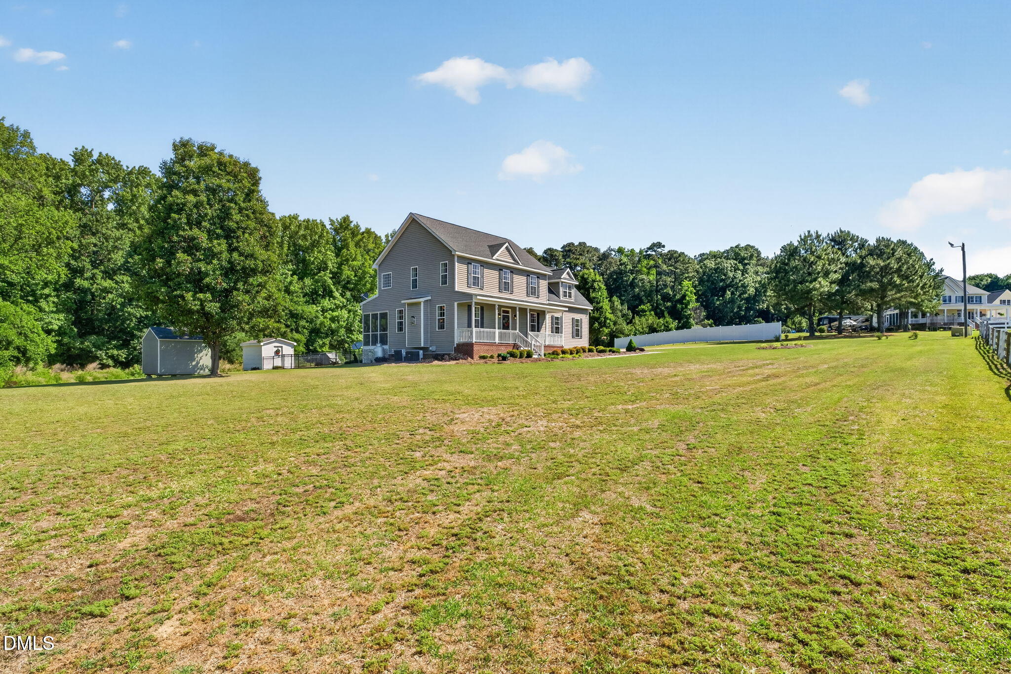 923 White Memorial Church Road Willow Spring, NC 27592 - Photo 6 of 46 a house view with swimming pool in front of it