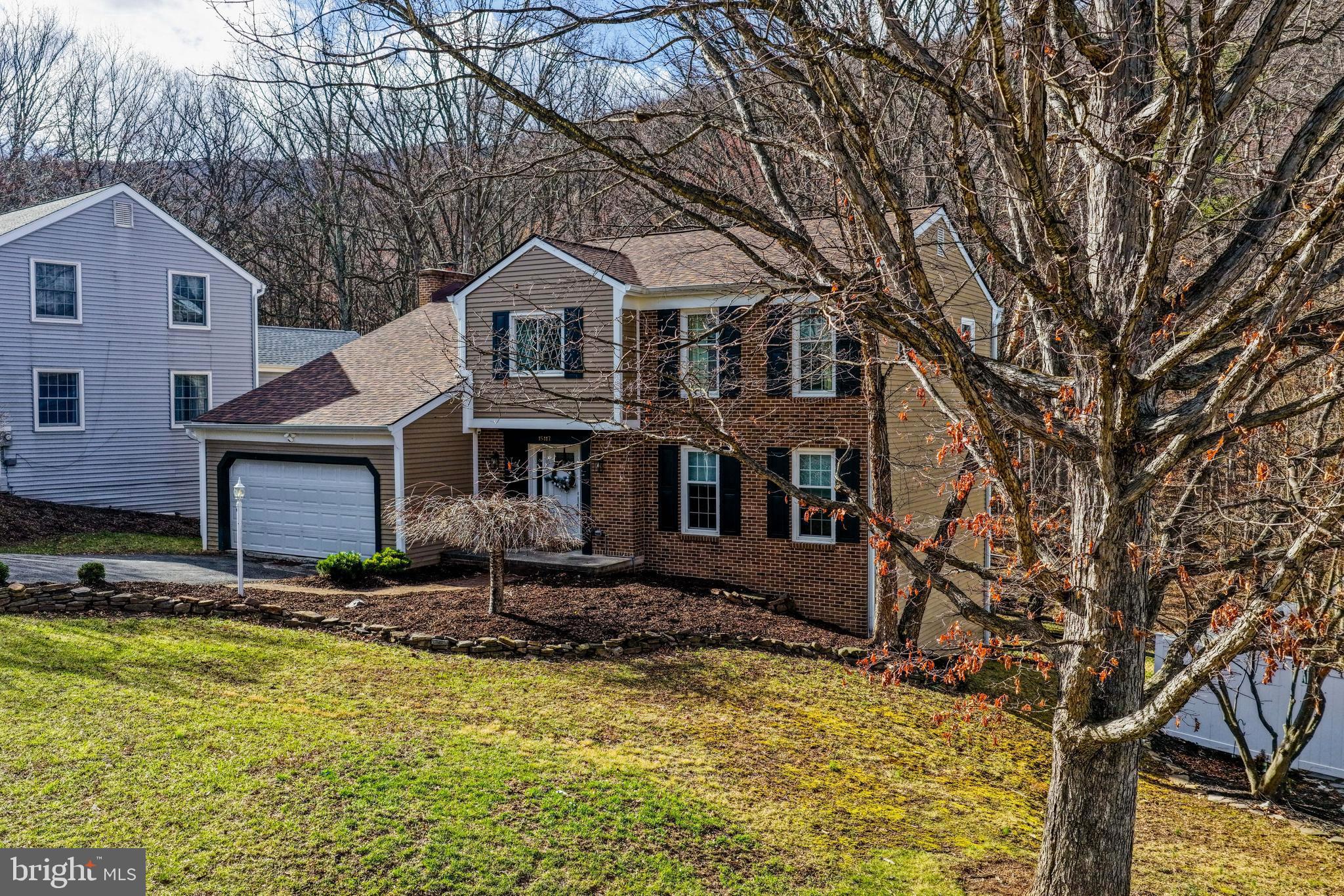 15117 Trail Ridge Road Southwest Cumberland, MD 21502 - Photo 2 of 43 a front view of a house with a yard