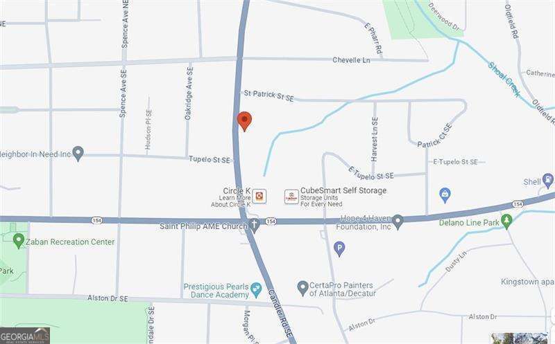 98 Candler Road Southeast Atlanta, GA 30317 - Photo 2 of 5 a picture of a room with a window and kitchen view