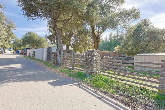 a view of backyard with green space