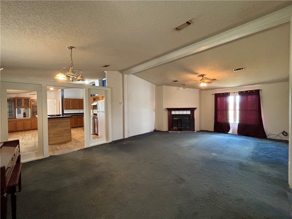 568 Jennifer Loop Orange Grove, TX 78372 - Photo 15 of 35 a view of a livingroom with a fireplace