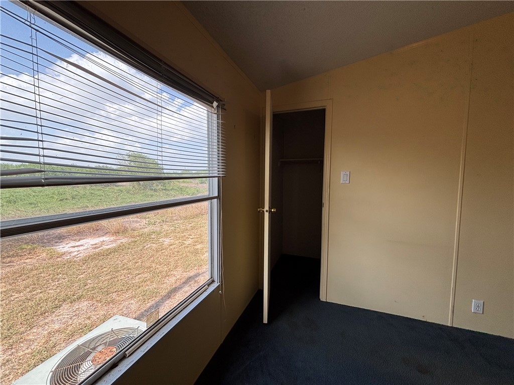 568 Jennifer Loop Orange Grove, TX 78372 - Photo 34 of 35 a view of a room with wooden floor