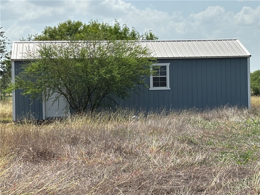 568 Jennifer Loop Orange Grove, TX 78372 - Photo 7 of 35 a view of a house with a yard