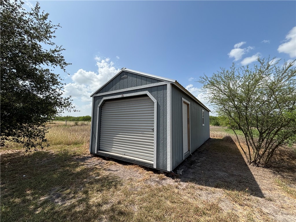 568 Jennifer Loop Orange Grove, TX 78372 - Photo 9 of 35 a front view of house with yard