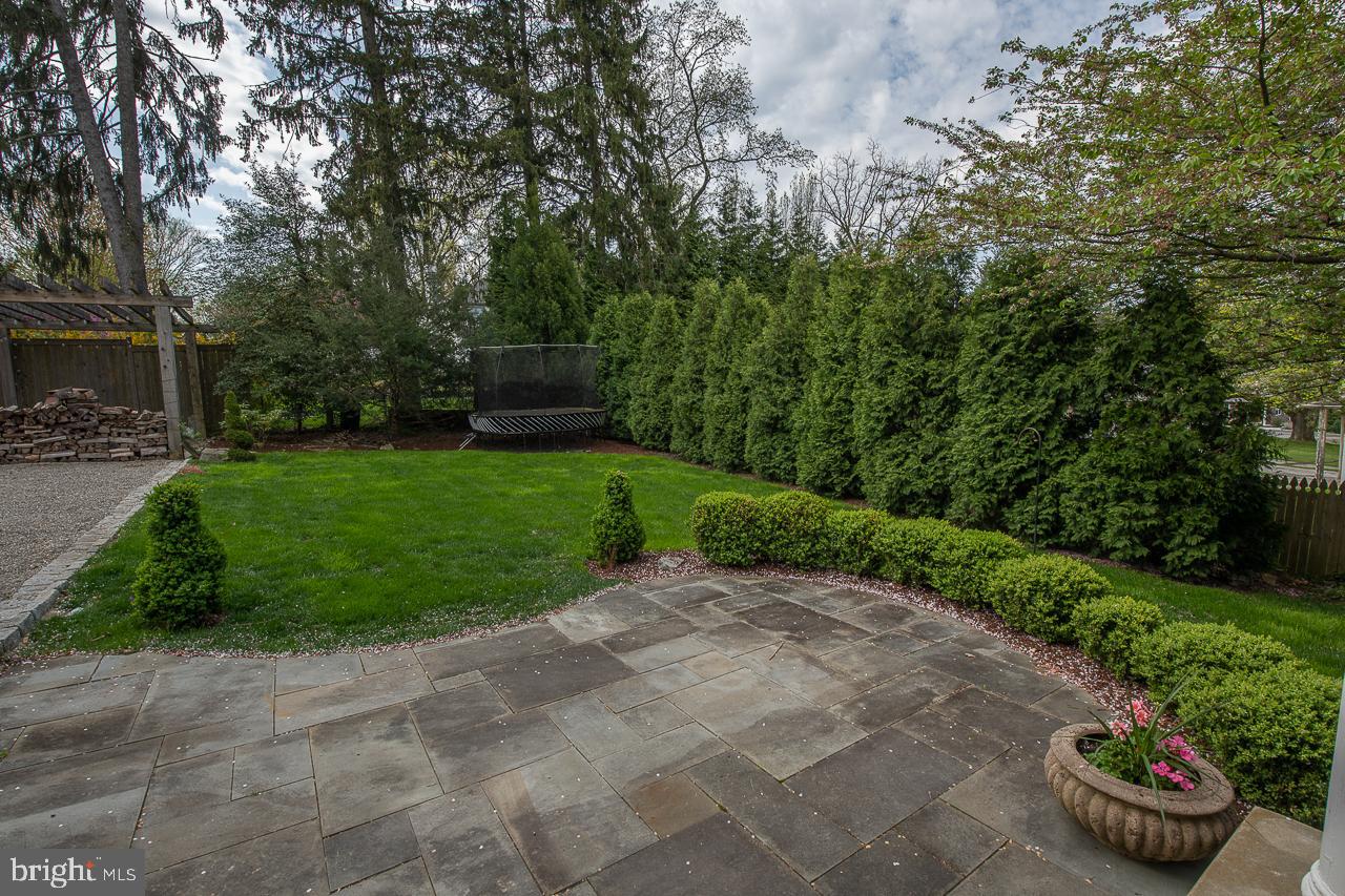 778 Upper Gulph Road Wayne, PA 19087 - Photo 32 of 36 Flagstone Patio surrounded by lush landscaping