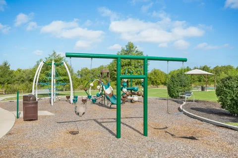 a view of swimming pool with outdoor seating