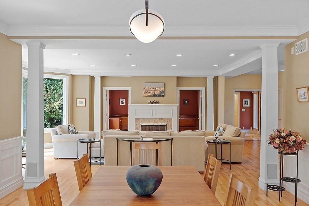 166 Tower Road Lincoln, MA 01773 - Photo 13 of 39 a living room with furniture potted plant and kitchen view