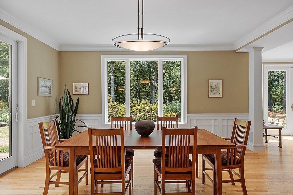 166 Tower Road Lincoln, MA 01773 - Photo 14 of 39 a view of a dining room with furniture window and outside view