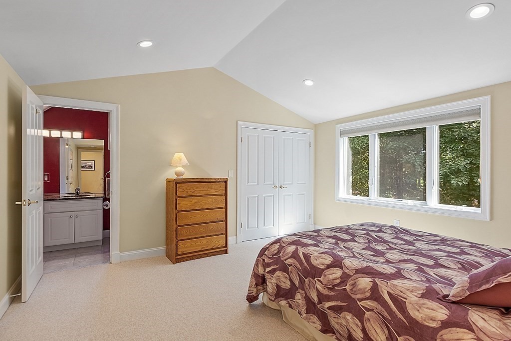 166 Tower Road Lincoln, MA 01773 - Photo 27 of 39 a bedroom with a bed and a dresser