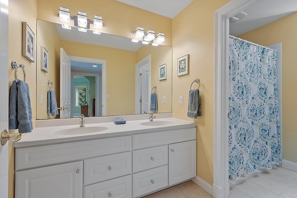 166 Tower Road Lincoln, MA 01773 - Photo 30 of 39 a bathroom with a double vanity sink mirror and double