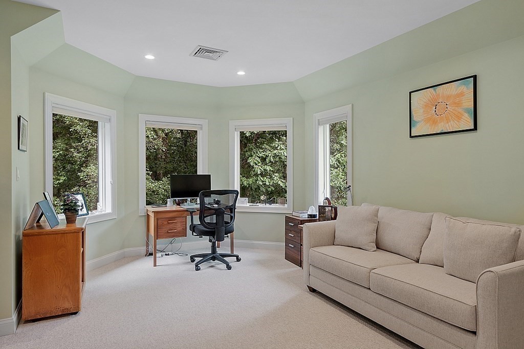 166 Tower Road Lincoln, MA 01773 - Photo 31 of 39 a living room with furniture and a large window