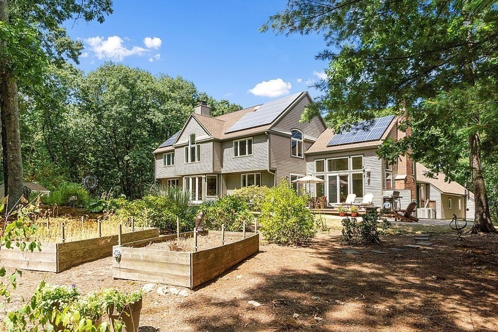 166 Tower Road Lincoln, MA 01773 - Photo 38 of 39 a front view of a house with a yard
