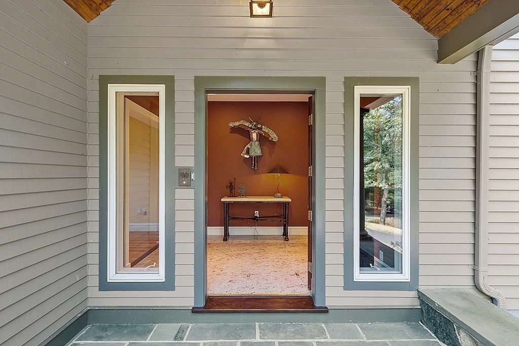 166 Tower Road Lincoln, MA 01773 - Photo 4 of 39 a front view of a house with a porch