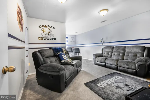 a living room with furniture and couch