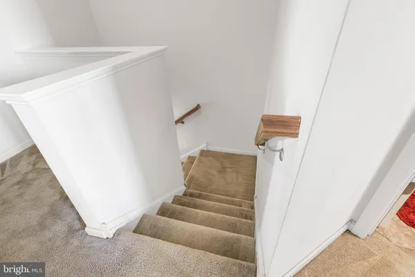 a view of a livingroom with white walls