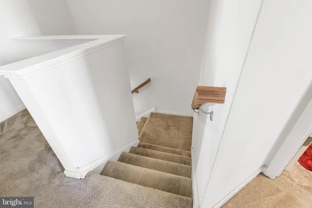 a view of a livingroom with white walls