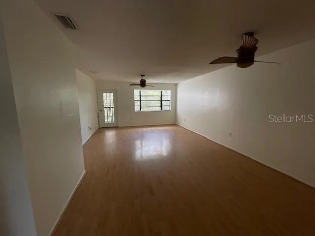 an empty room with windows