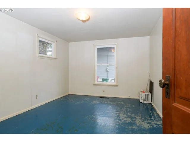 a bathroom with a sink mirror and toilet