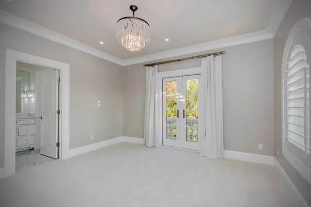 a kitchen with stainless steel appliances granite countertop a sink cabinets and wooden floor