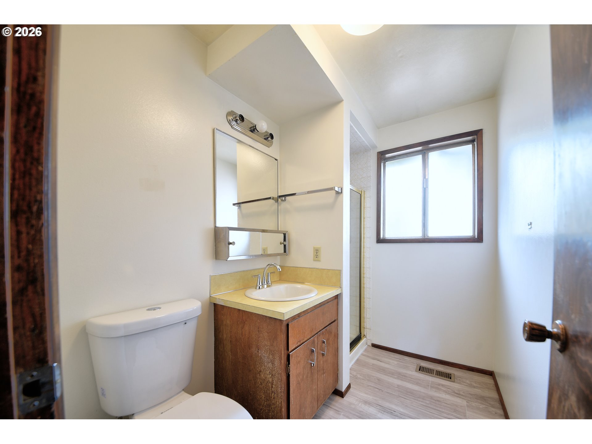 1798 Gilham Road Eugene, OR 97401 - Photo 12 of 30 a bathroom with a sink and a toilet