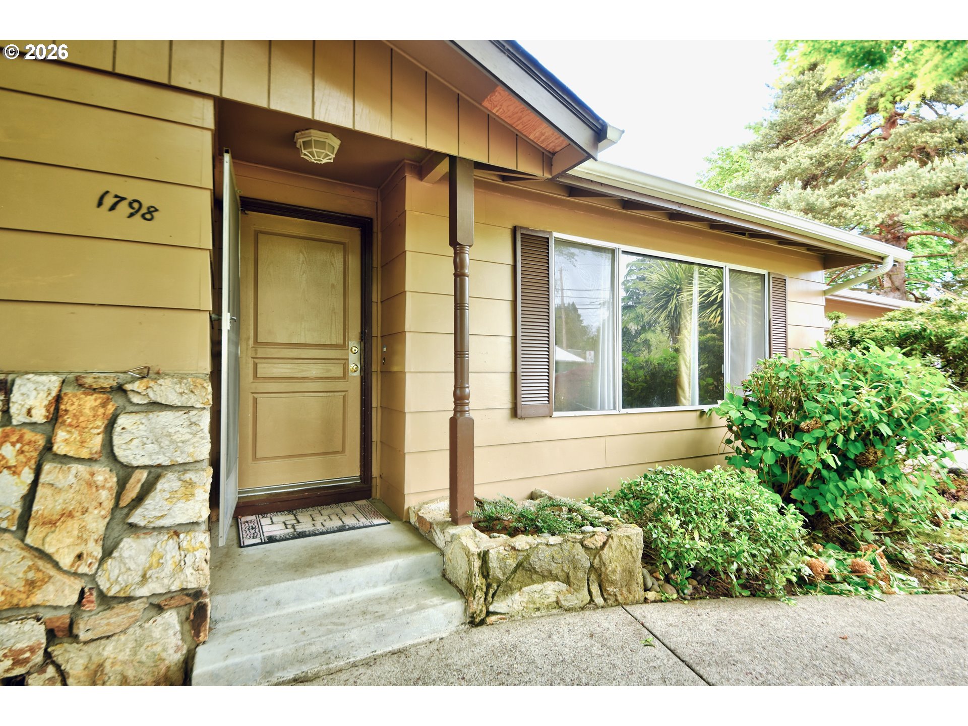 1798 Gilham Road Eugene, OR 97401 - Photo 2 of 30 a view front of house with a outdoor space