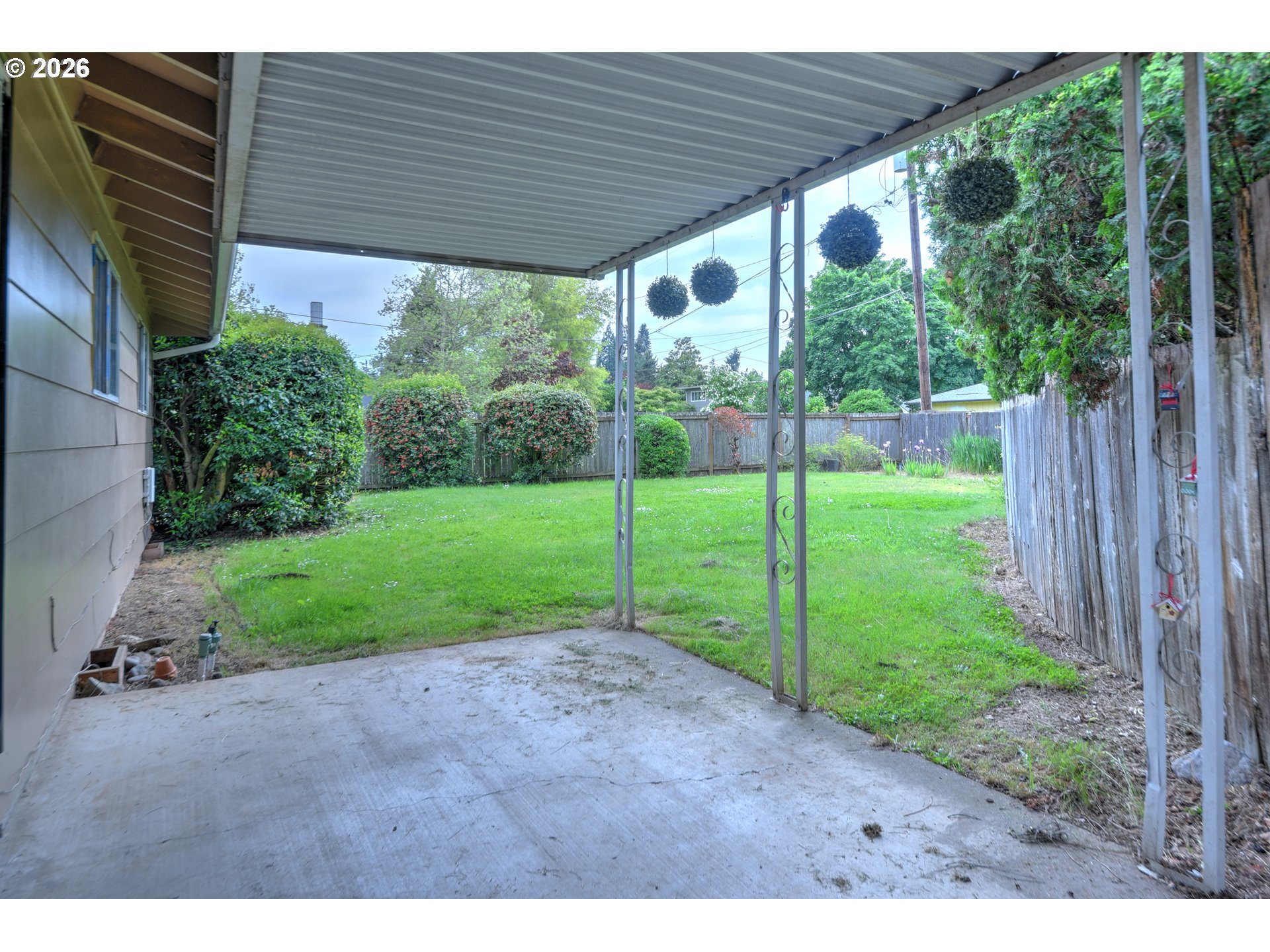1798 Gilham Road Eugene, OR 97401 - Photo 23 of 30 a view of a backyard with plants and garden