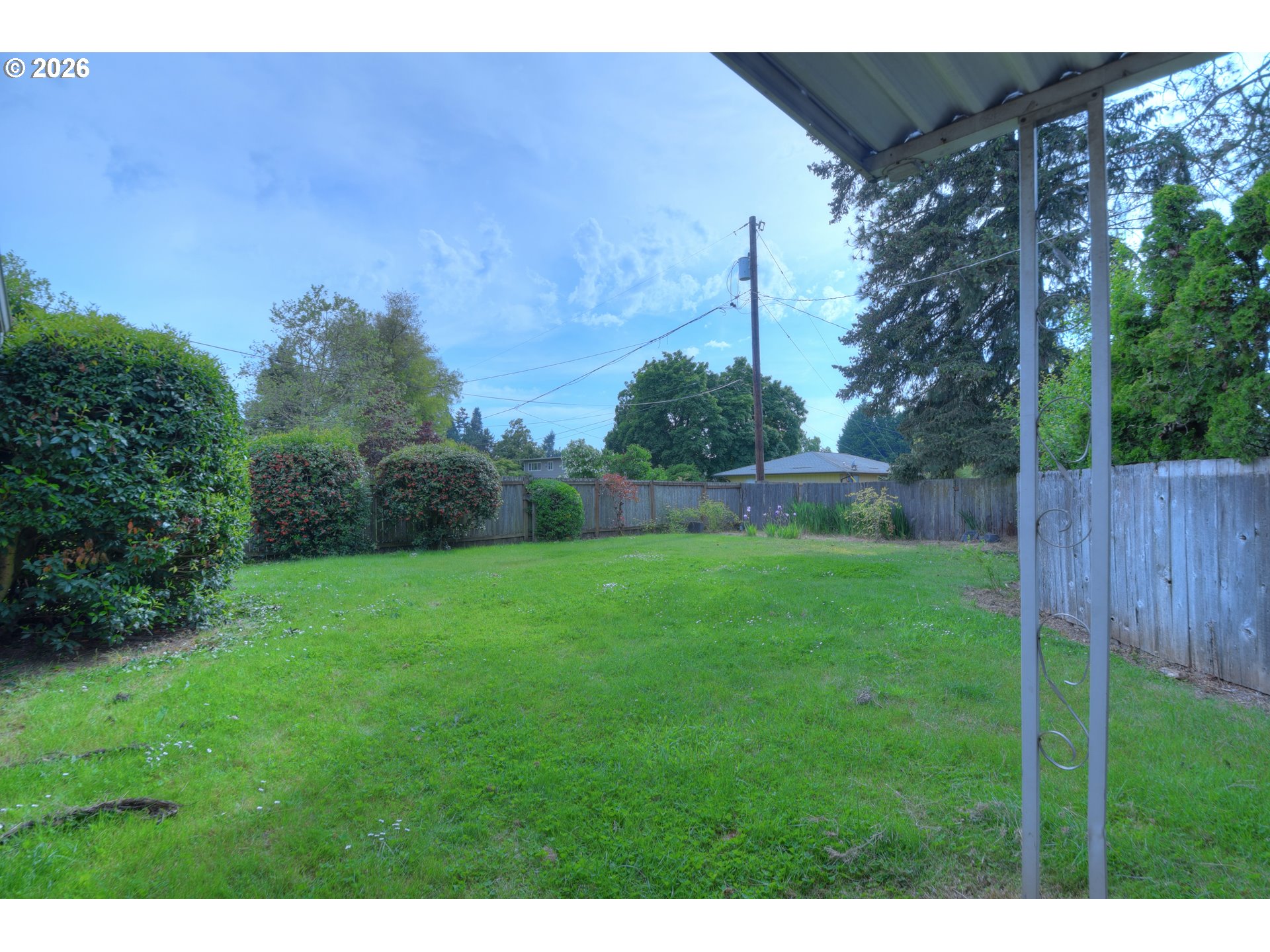 1798 Gilham Road Eugene, OR 97401 - Photo 24 of 30 a view of a backyard with a wooden fence