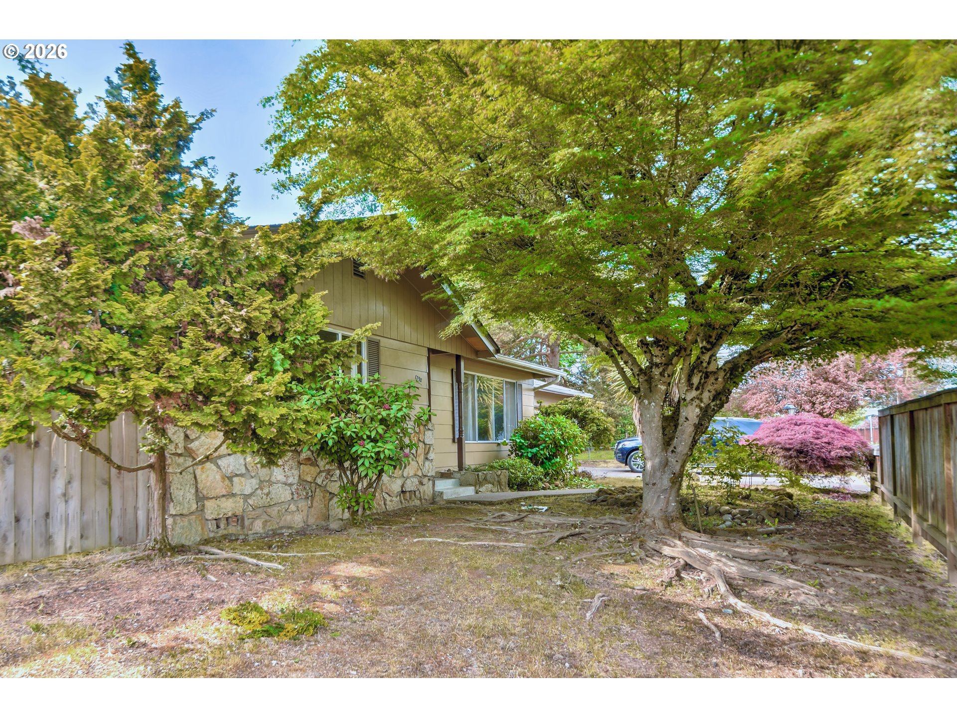 1798 Gilham Road Eugene, OR 97401 - Photo 28 of 30 front view of a house with a tree