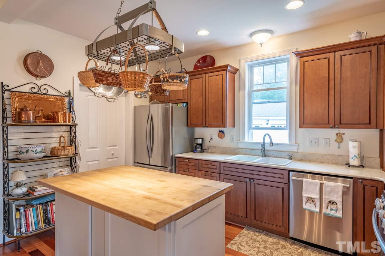 536 Pine Tree Road Chase City, VA 23924 - Photo 14 of 30 Solid Surface Counter tops, Butcher block island, gas range, microwave, dishwasher, refrigerator.