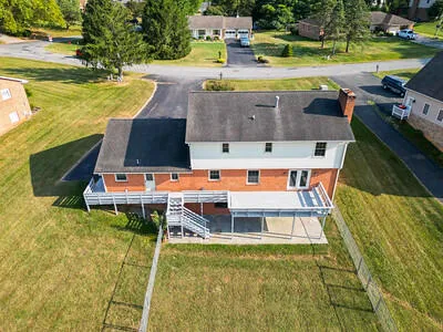 swimming pool view with a seating space