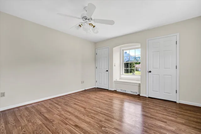 a kitchen with a refrigerator and a sink