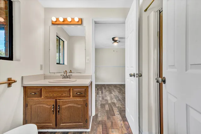 an aerial view of a house with a swimming pool